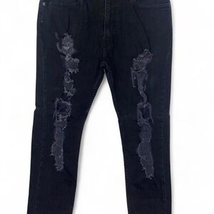 Levi’s 512 Slim Taper Distressed Jeans